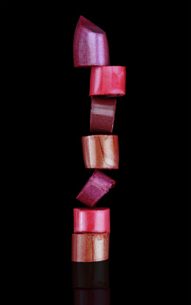 Lipstick stack on black background