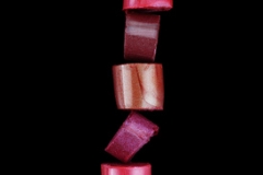 Lipstick stack on black background